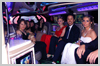 Interior photo of School Ball Perth Limo kids in the Candy Red Hummer before arriving for their entrance at this gala event